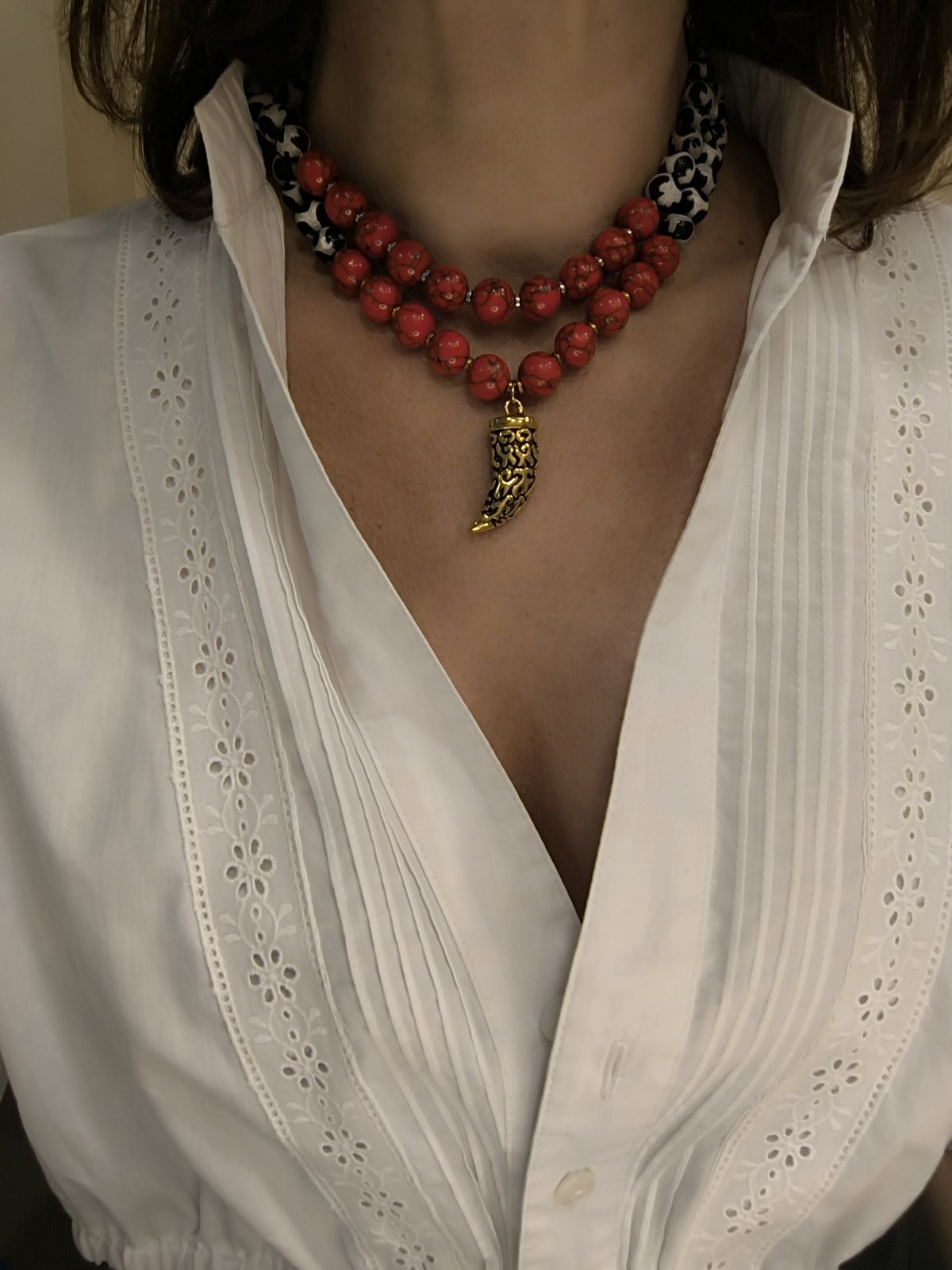 “Dual Instinct” Hematite Necklace – Gold Stainless Steel & White Horn Pendant